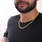 Man wearing 14K gold over stainless steel cuban link chain