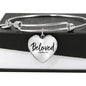 Heart shaped charm on a bracelet that says beloved Colossians 3:12